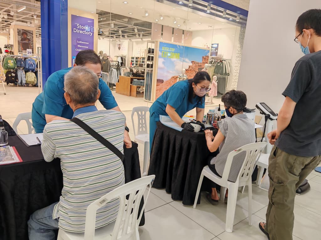 AG Lifecare Clinic health screening booth at community health awareness event in Johor Bahru